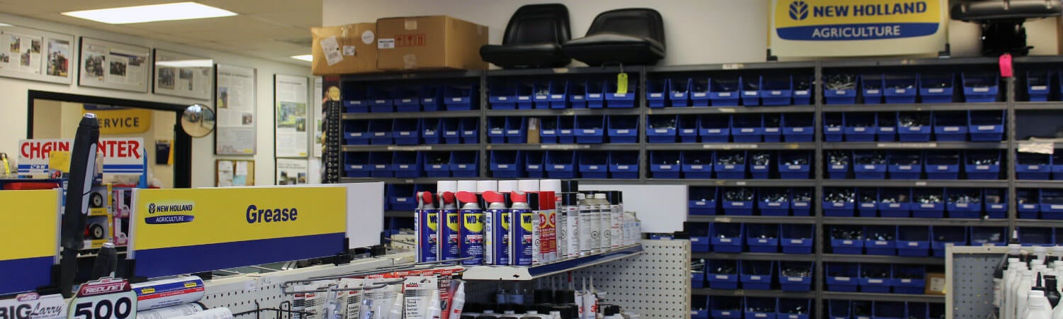 Bolts bin behind a shelf of great tubes and aerosol chemicals such as WD-40